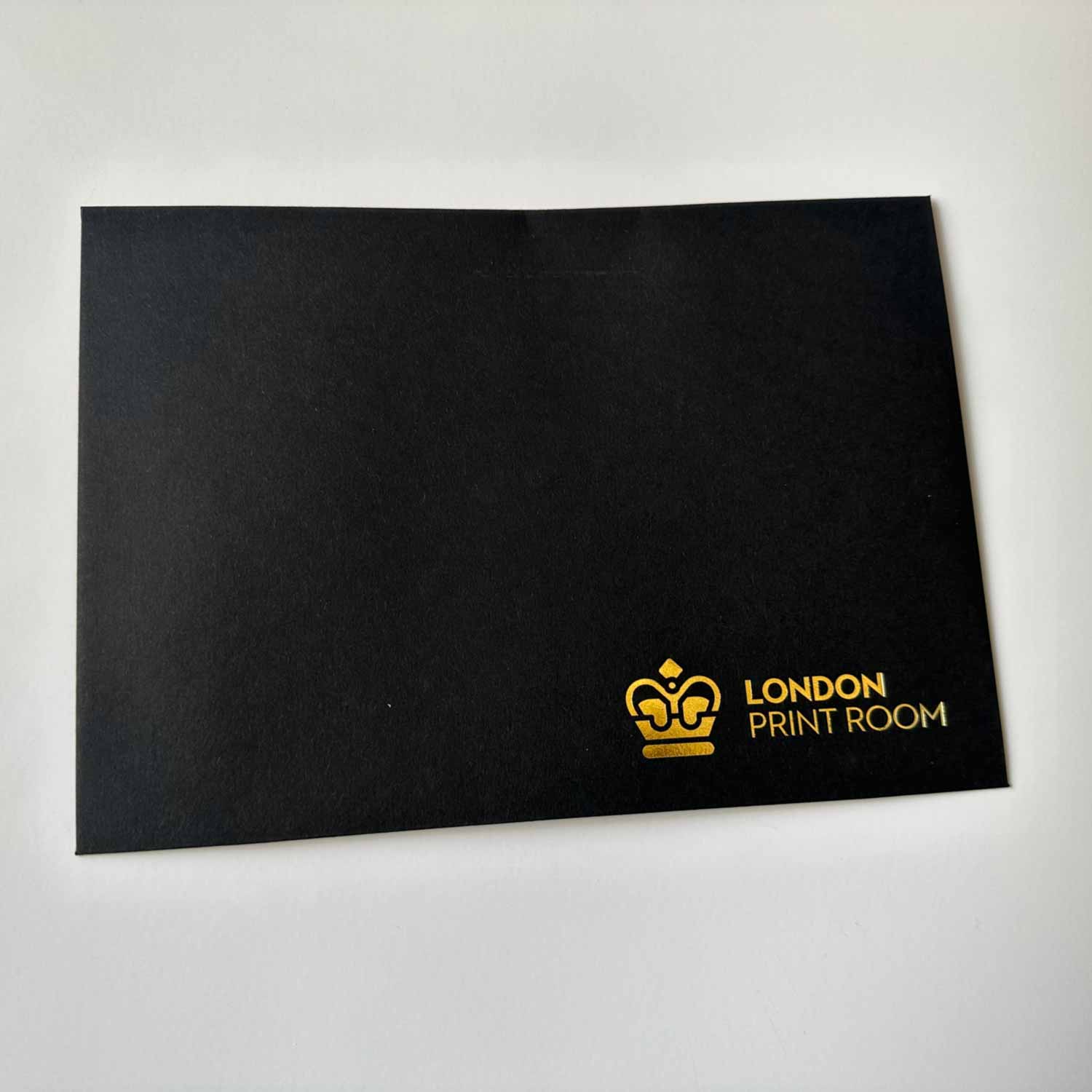 London Print Room | GF Smith Black Envelope foiled in gold foil.